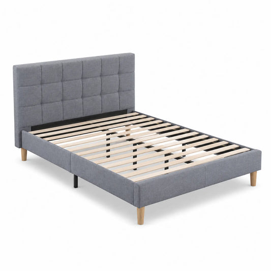 Letto matrimoniale con testiera imbottita in tessuto e legno